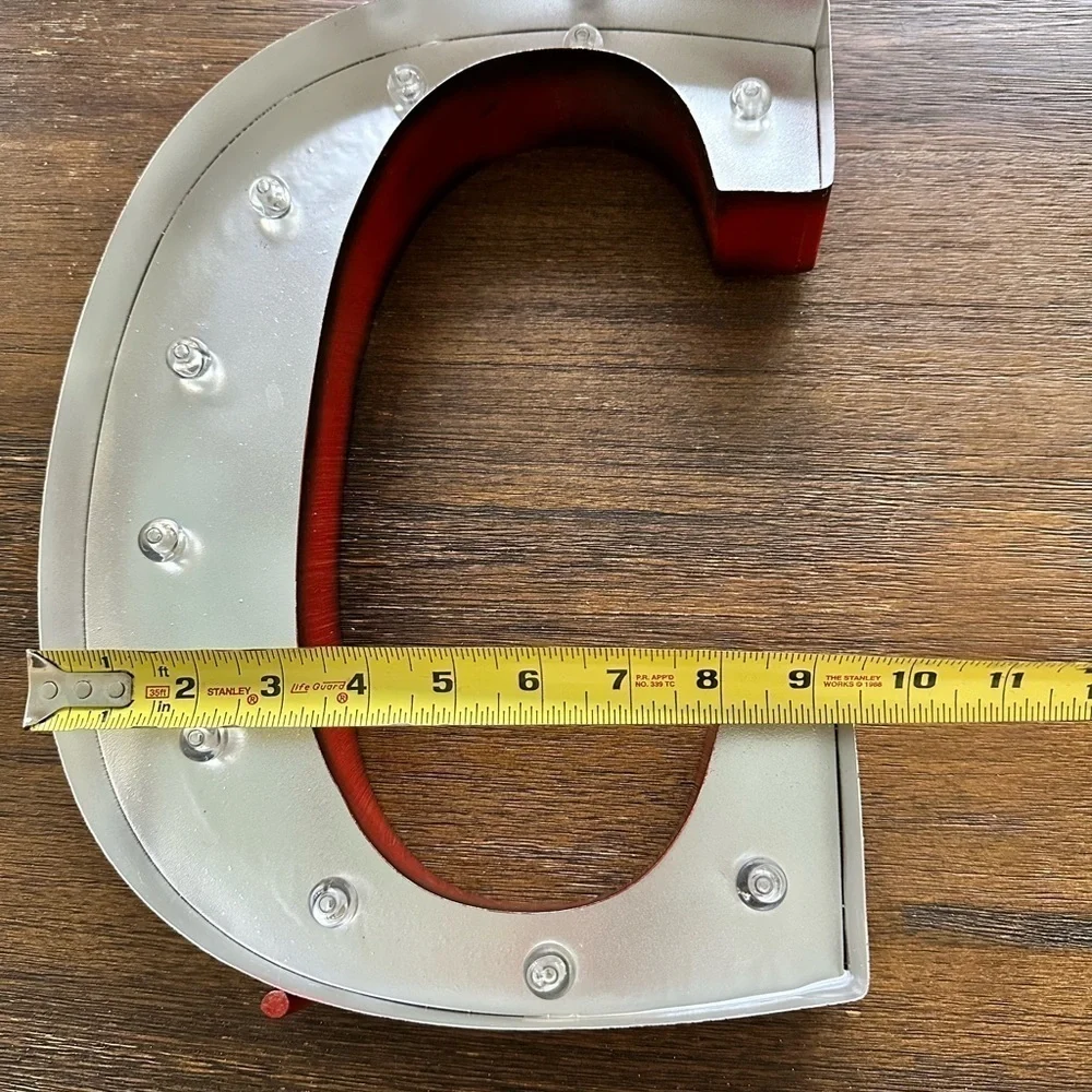 Industrial, light-up, free-standing, C initial decoration